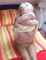Blonde mature slut playing with herself