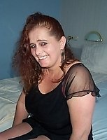 Big titted, mature and horny as hell