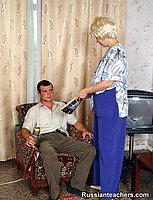 A guy with a beer is undressed by a hot mature blonde