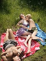 Three old and young lesbians having fun in the sun