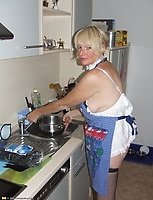 Naughty housewife gets frisky in the kitchen