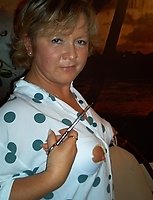 Mature slut Rita gets kinky with her scissors